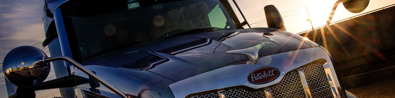 Dot Transportation truck with sunset